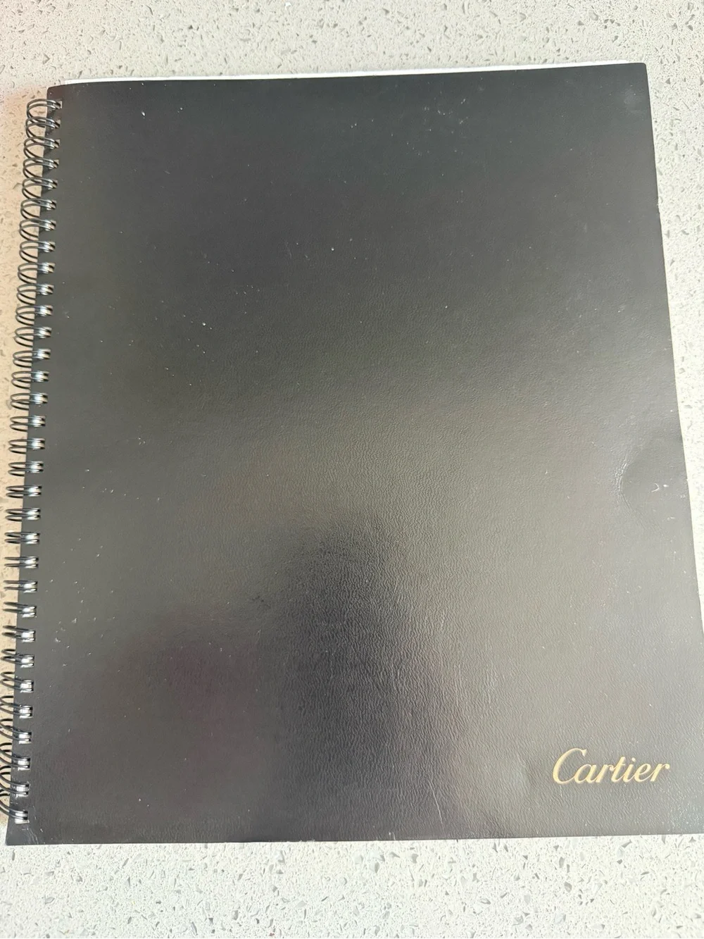 Cartier Black Notebook with Gold Logo